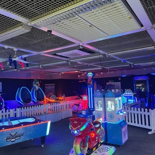 Neon-lit ride floor at VR Liverpool